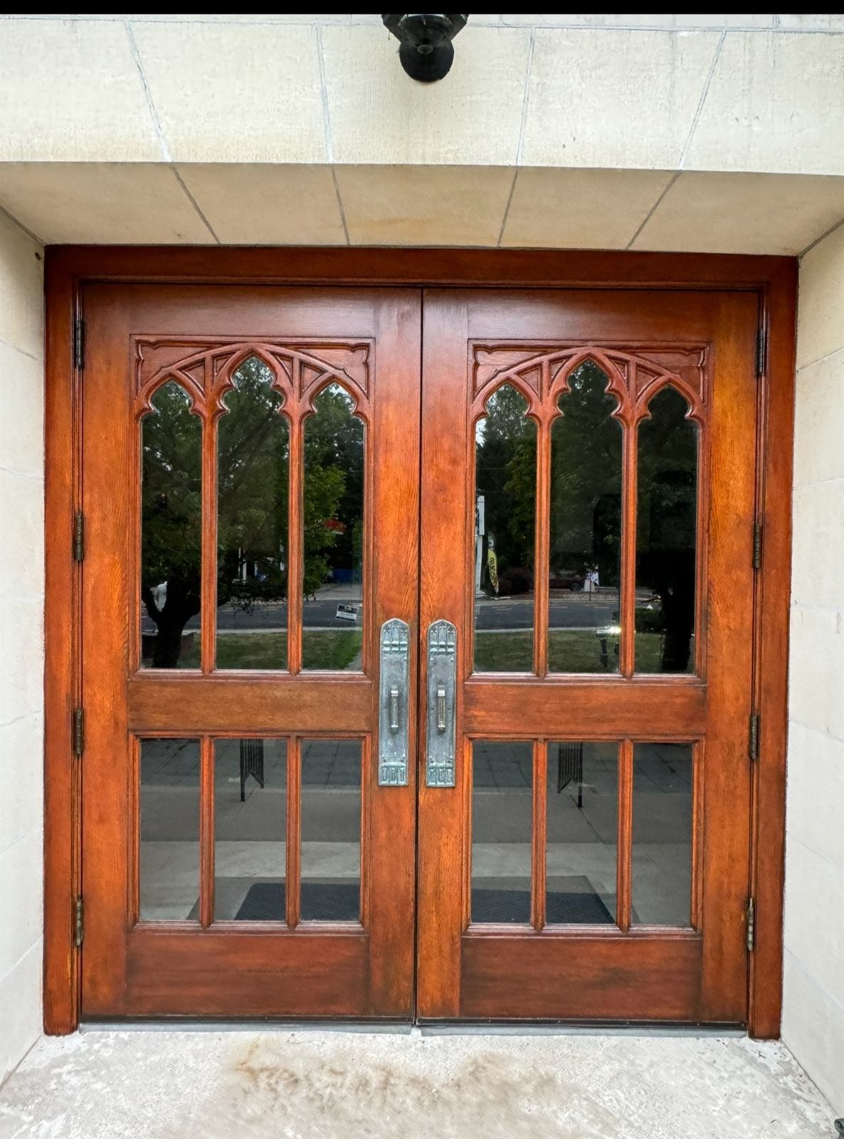 Restored wood church door after refinishing