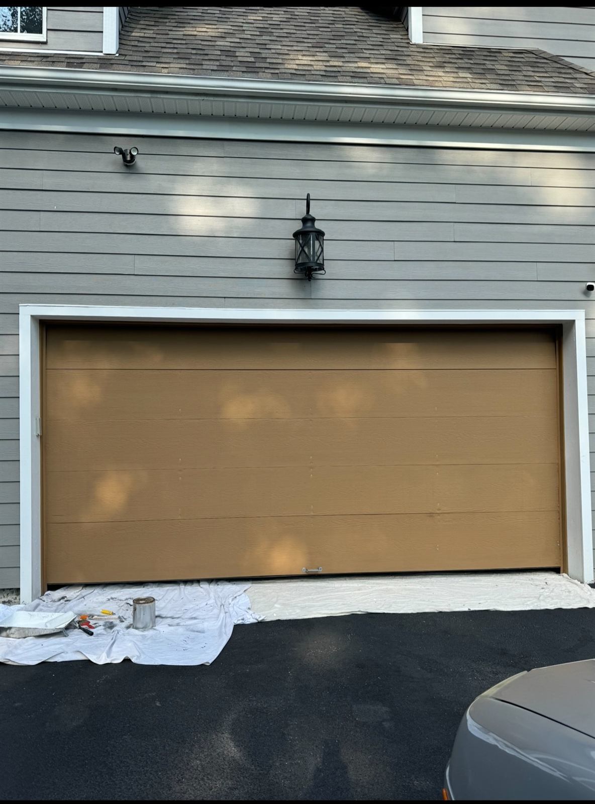 Garage door before custom wood-look faux finish
